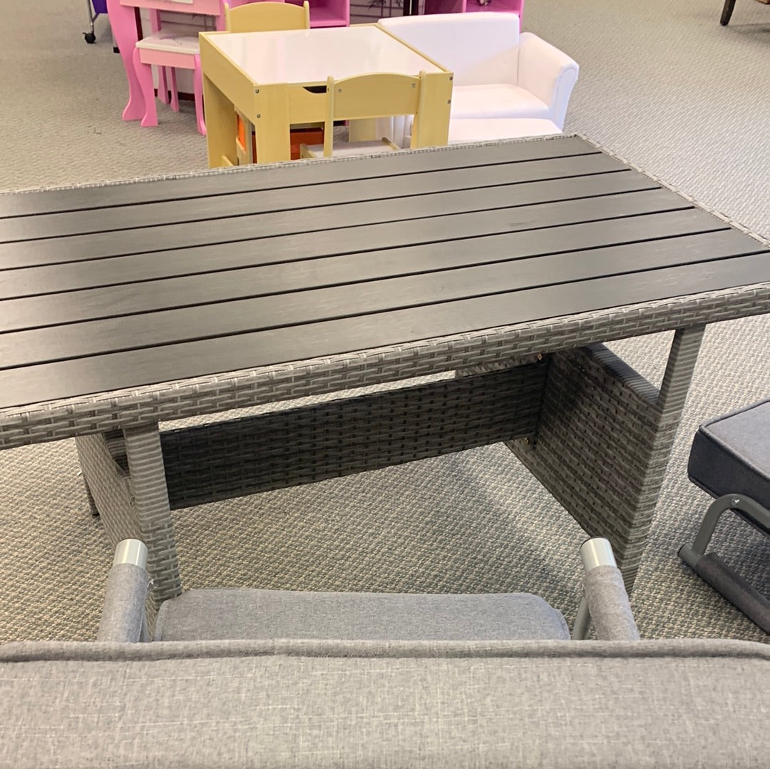 52`` x 30`` grey wash rattan frame patio table with black slat top, minor scratch, fully awssembled