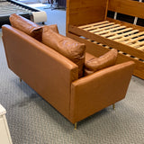 52.75 Loveseat with storage, caramel faux leather