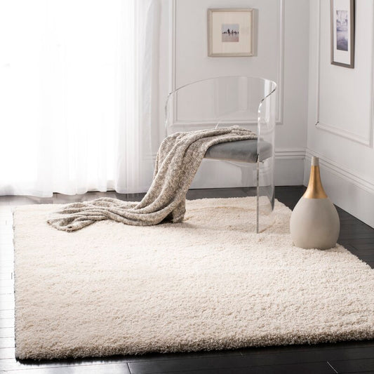 Mckeehan Ivory Area Rug  3` x 5`